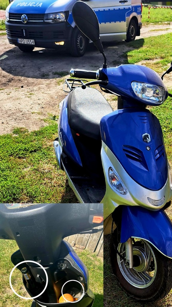 motorower koloru niebieskiego w tle policyjny radiowóz