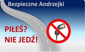 plakat z drogą, przekreślonym kluczykiem od pojazdu i napisem &quot;piłeś nie jedź&quot;