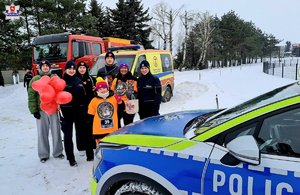 policjanci i wolontariusze wielkiej orkiestry świątecznej pomocy