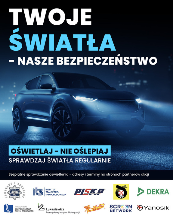 pojazd na ciemnym tle z włączonymi światłami mijania